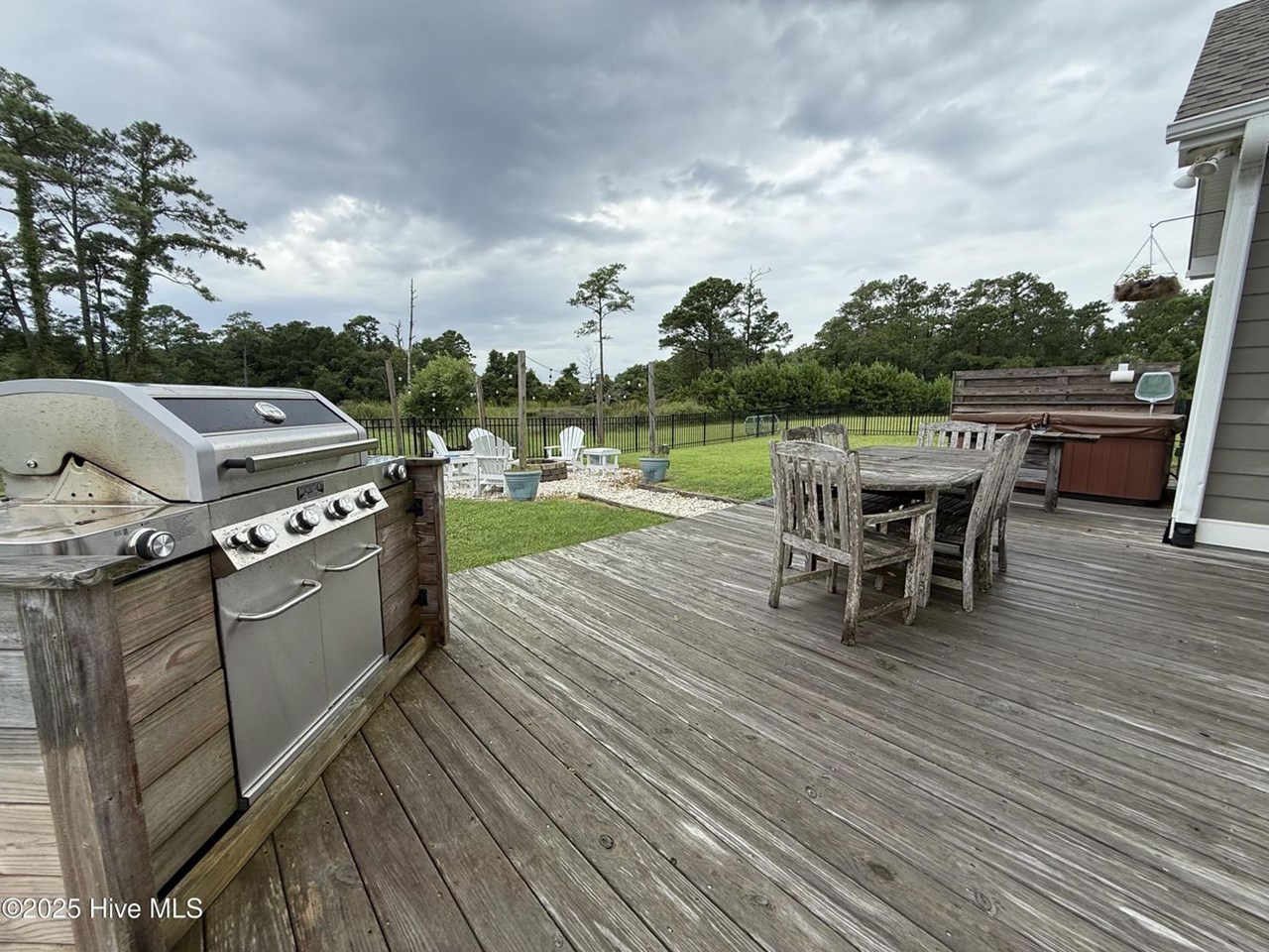 back deck with hot tub included