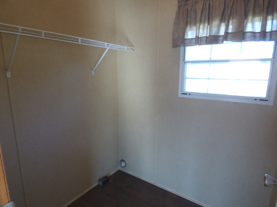 laundry room laundry off kitchen. has hookups for washer & dryer. new tile-look lvp flooring