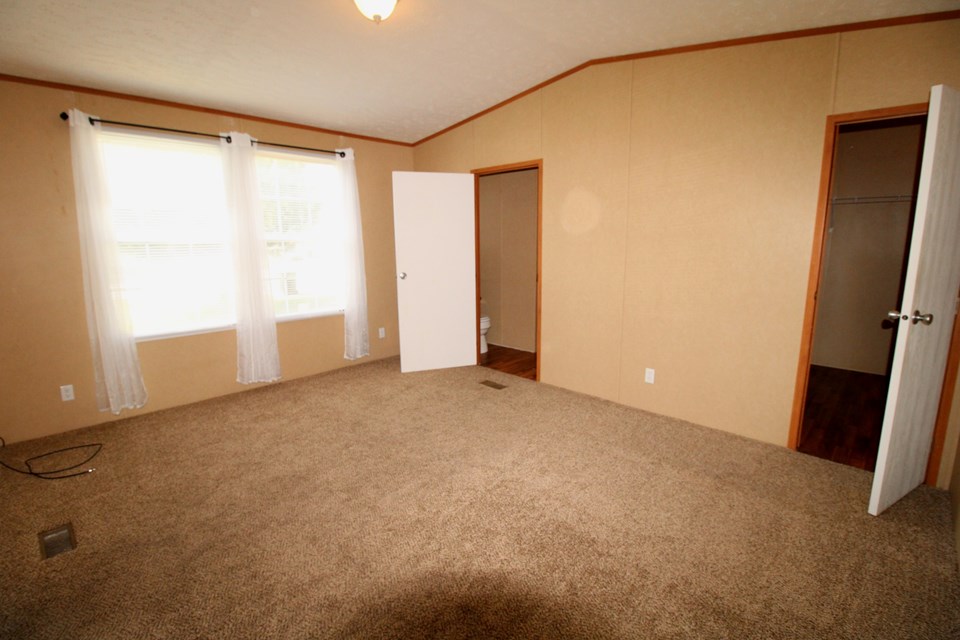 master bedroom spacious master bedroom with walk-in closet and private bath. new plush carpet installed.