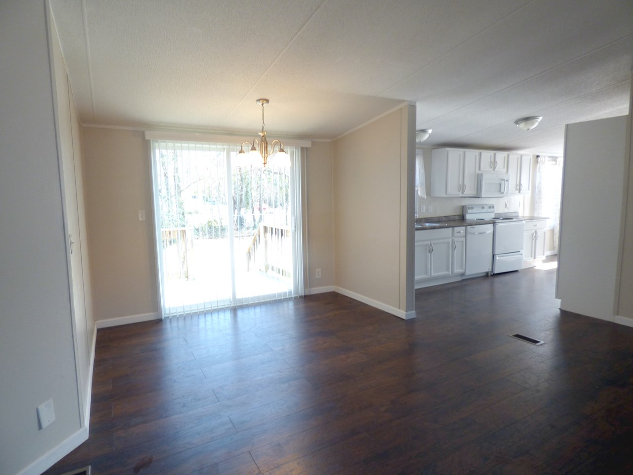 dining area open to living room and kitchen approx measurements 20' x 7'