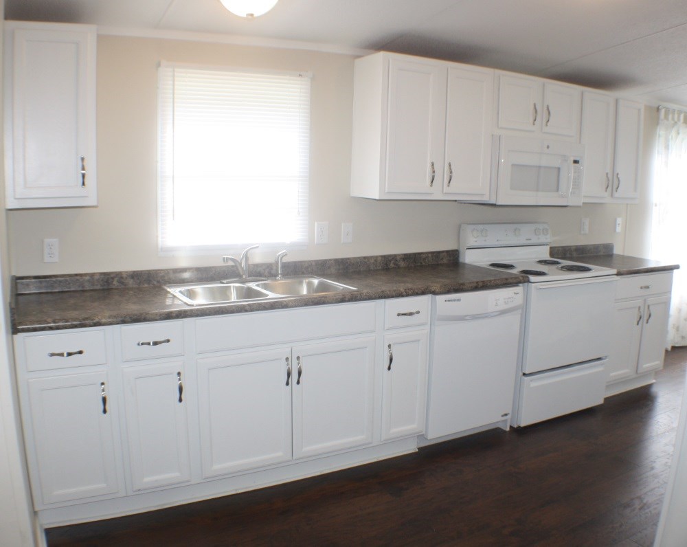 kitchen includes dishwasher, stove, microwave approx measurements 14' x 17'4